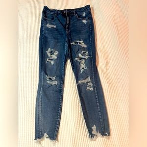 Like New American Eagle Ripped Skinny Jeans. 14 Short. Stone wash Blue. Stretch.